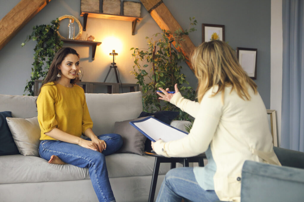 Counselor meeting with a patient to discuss pregnancy options at First Care Women’s Health.