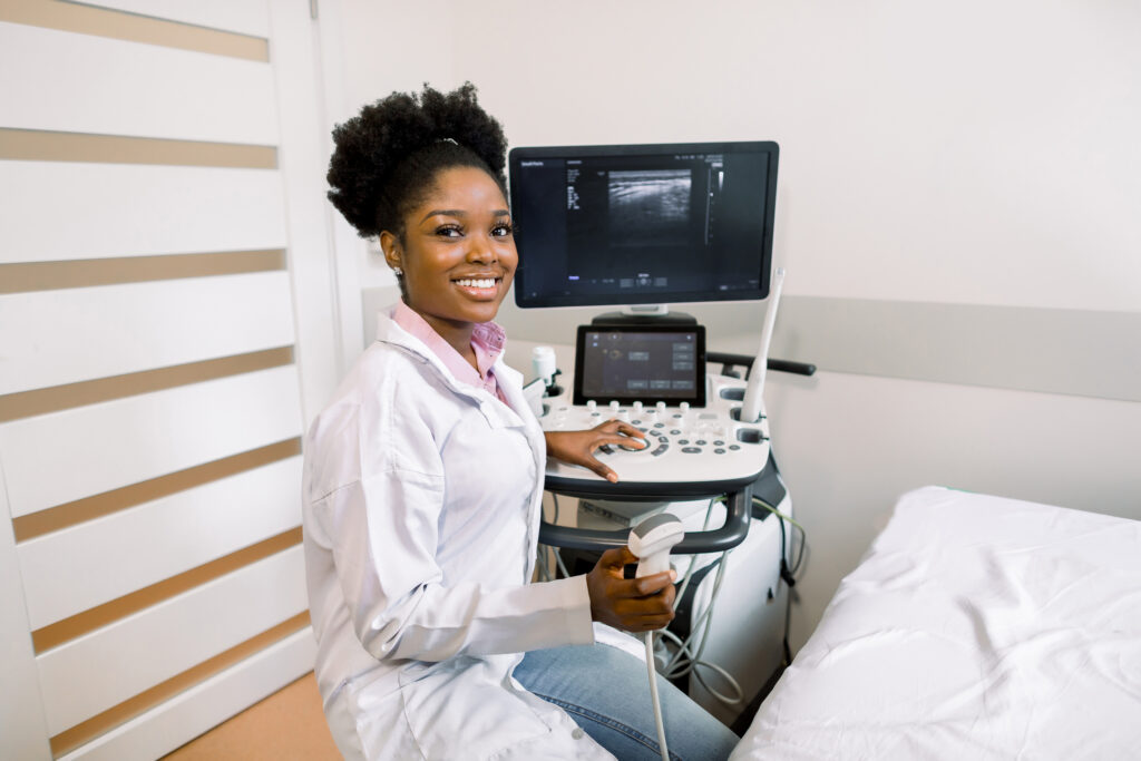 Nurse preparing equipment for an ultrasound appointment at First Care Women’s Health.