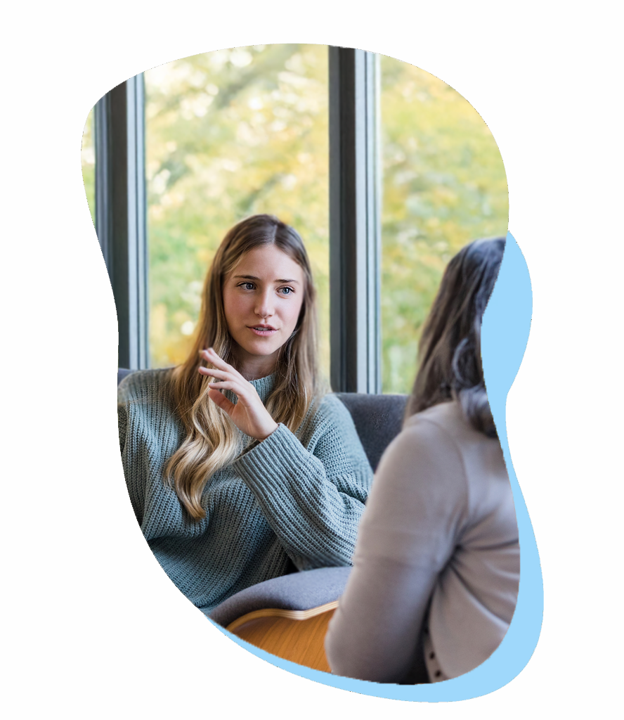 Woman listening carefully while considering abortion at First Care Women’s Health.