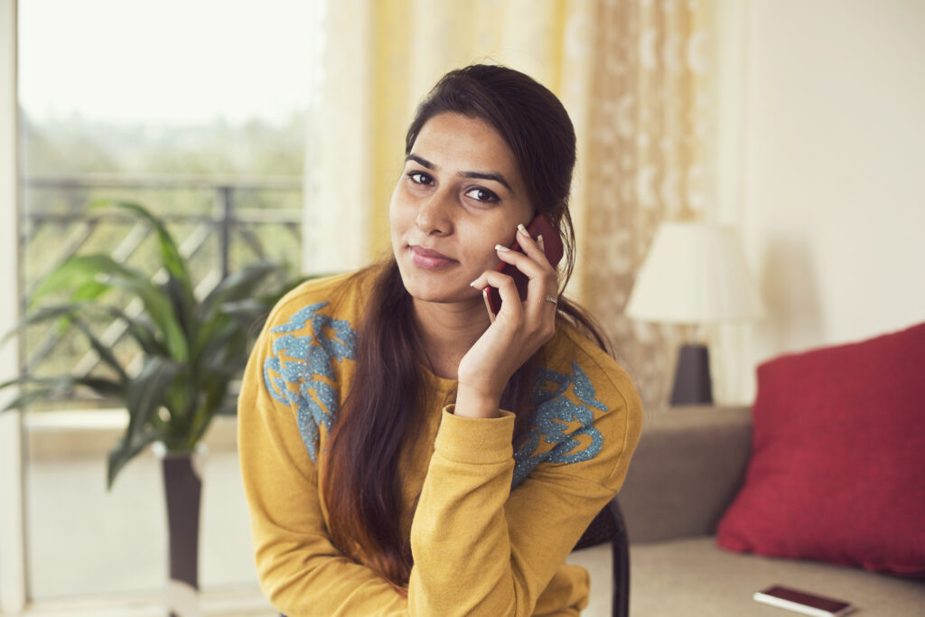 Girl texting First Care Women's Health to set up an appointment for her unexpected pregnancy.