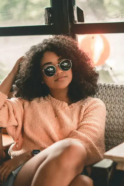 woman sits in waiting room at first care in manassas to find out about the cost for the abortion pill.