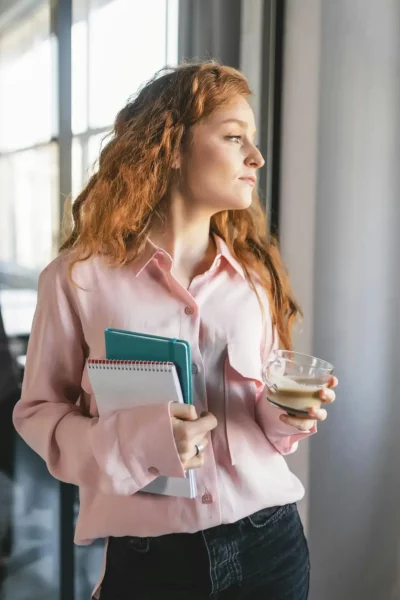 young woman at home after calling first care women's health for abortion pill information